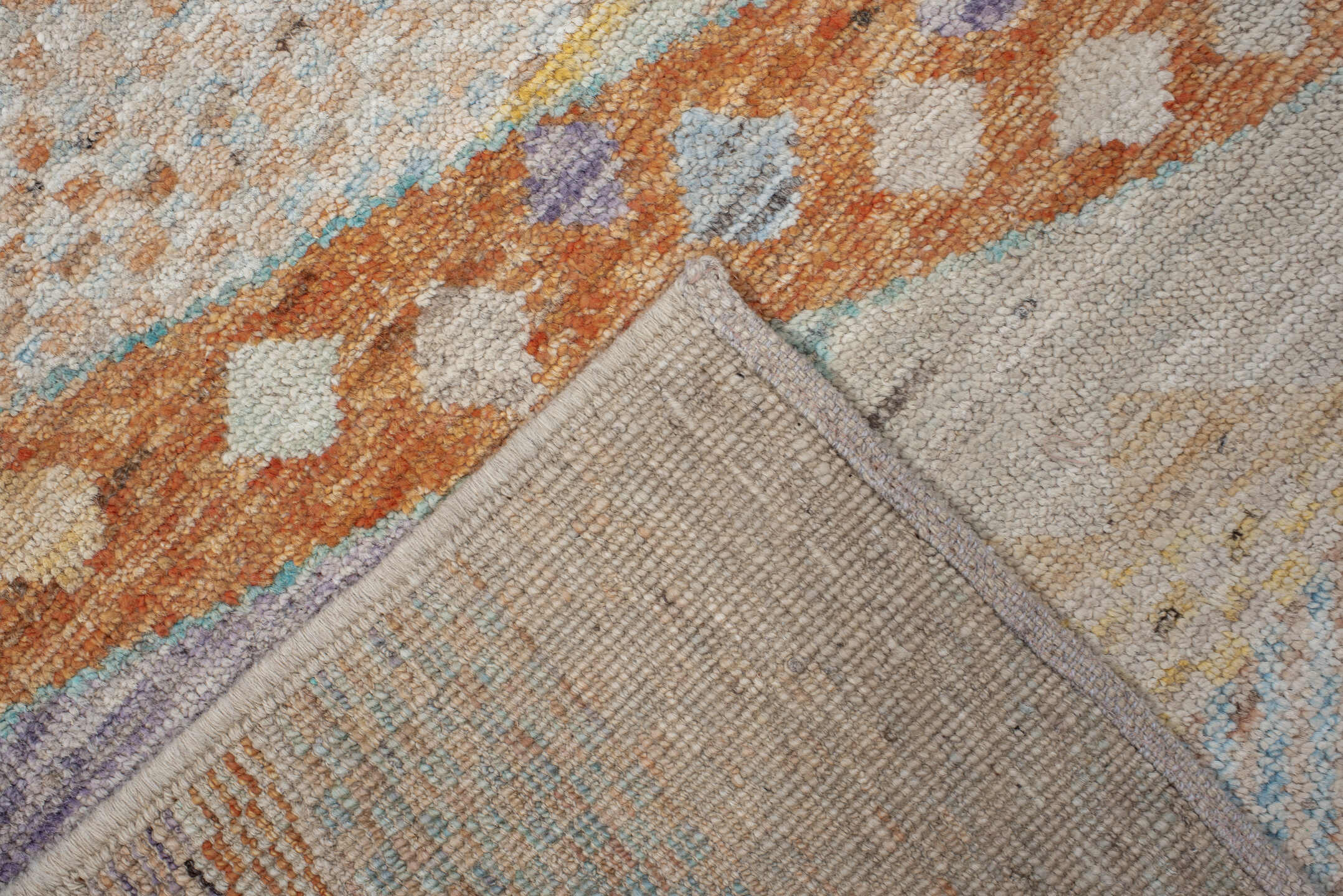 3' x 9' one-of-a-kind handmade vintage Tulu runner rug. Color palette: ivory, aqua, terra cotta, gold, lavender, taupe, teal