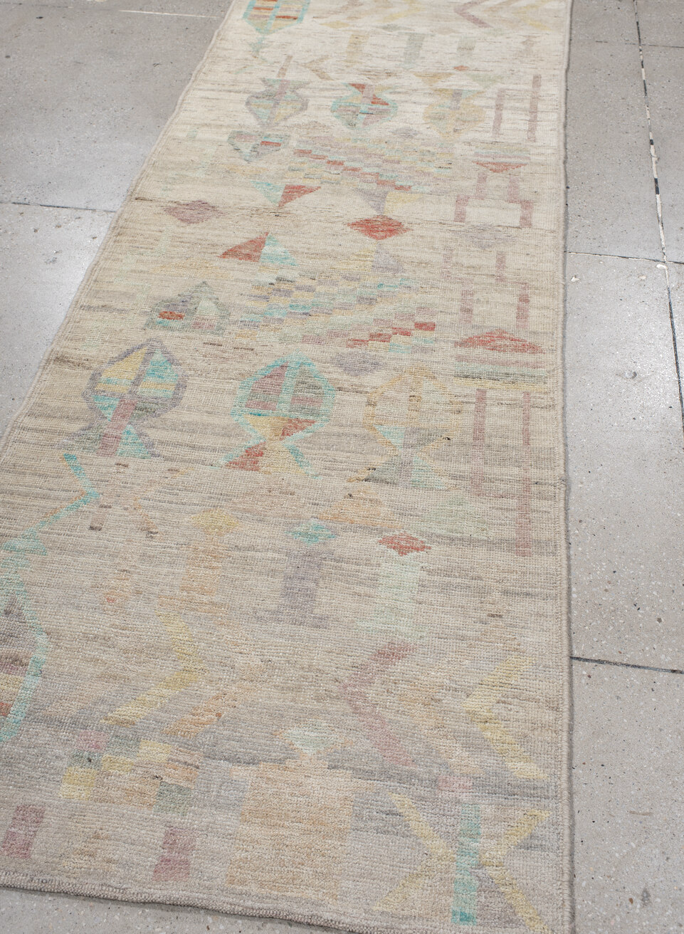 3' x 9' one-of-a-kind handmade vintage Tulu runner rug. Color palette: brown, gray, light gray, off-white, pink, silver