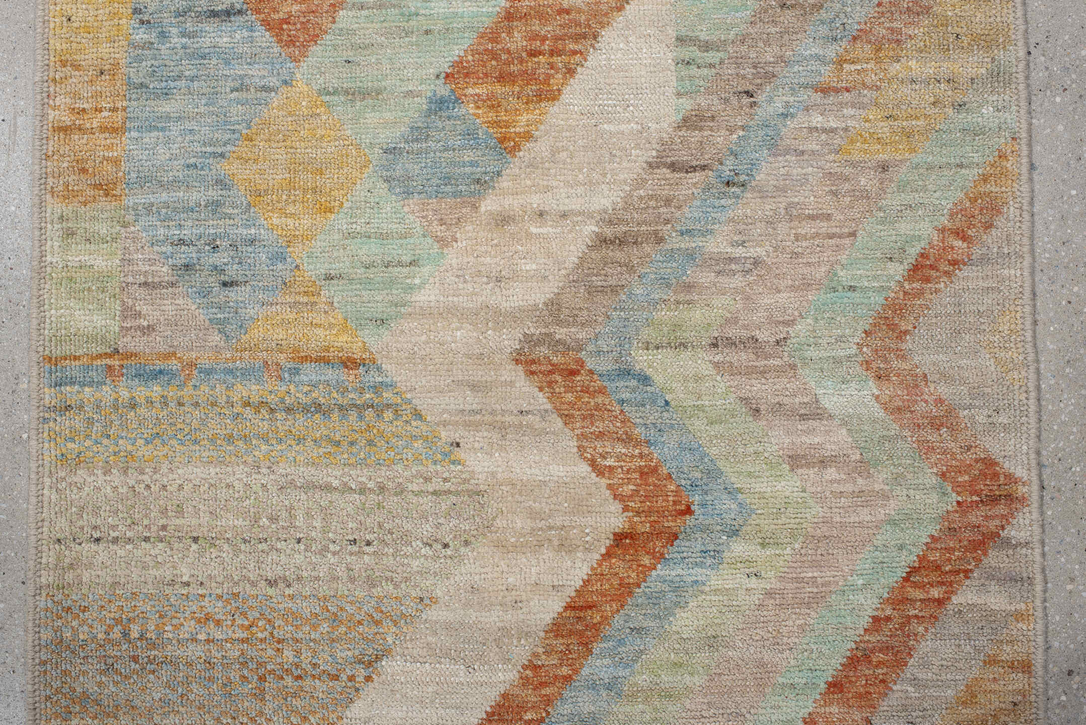 2' x 9' one-of-a-kind handmade vintage Tulu runner rug. Color palette: taupe, ivory, sage, terra cotta, pale blue, gold