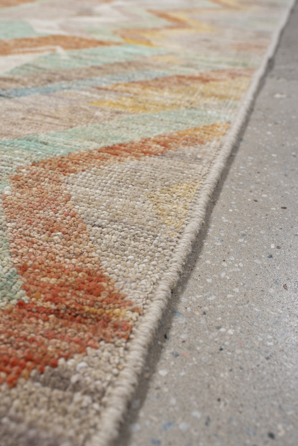 2' x 9' one-of-a-kind handmade vintage Tulu runner rug. Color palette: taupe, ivory, sage, terra cotta, pale blue, gold