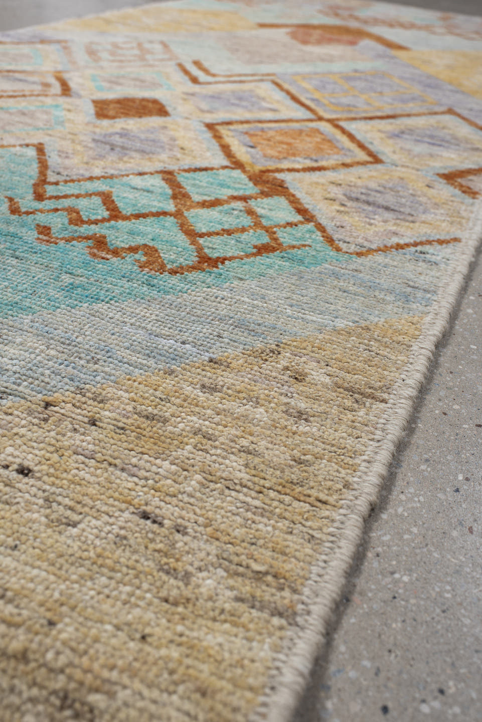 3' x 9' one-of-a-kind handmade vintage Tulu runner rug. Color palette: ivory, sky_blue, lavender, gold, rust, taupe, peach