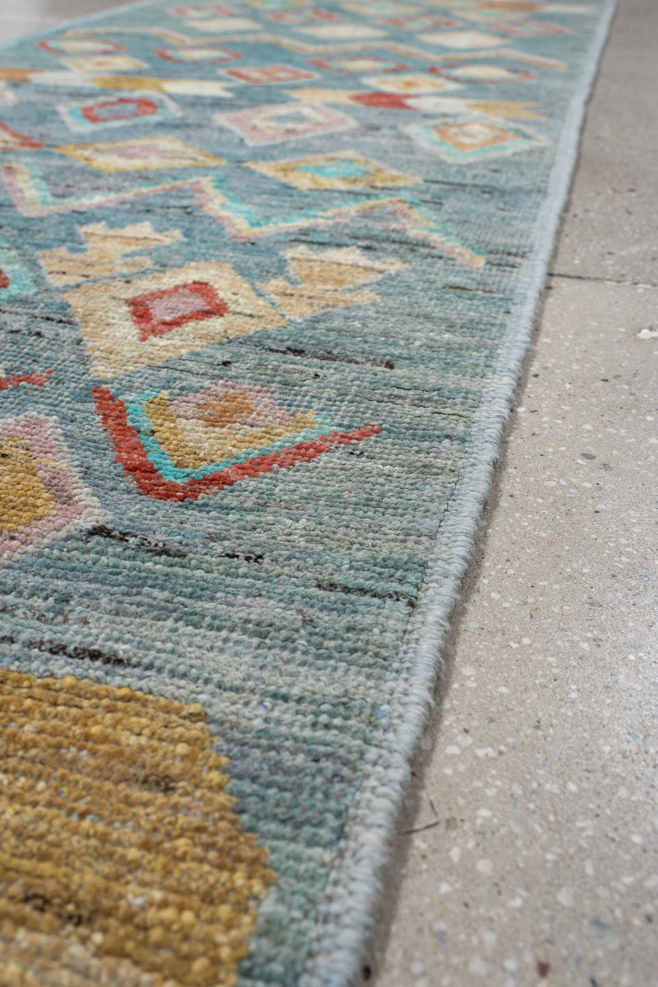 2' x 9' one-of-a-kind handmade vintage Tulu runner rug. Color palette: sky blue, ivory, turquoise, coral, gold, peach