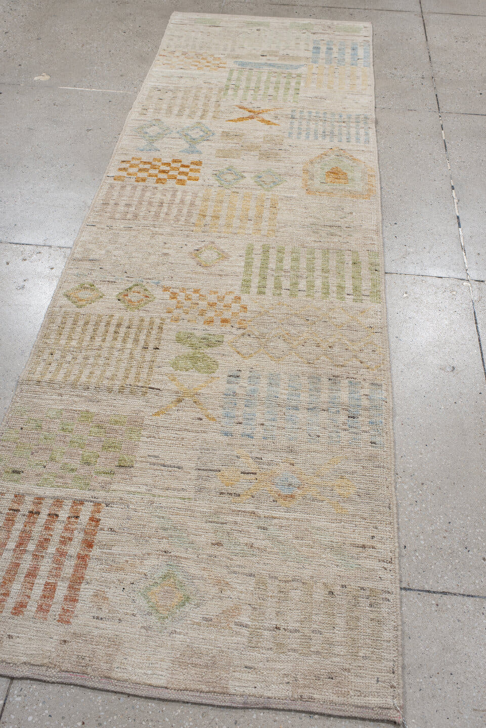 2' x 9' one-of-a-kind handmade vintage Tulu runner rug. Color palette: ivory, beige, sage, pale blue, soft gold, apricot
