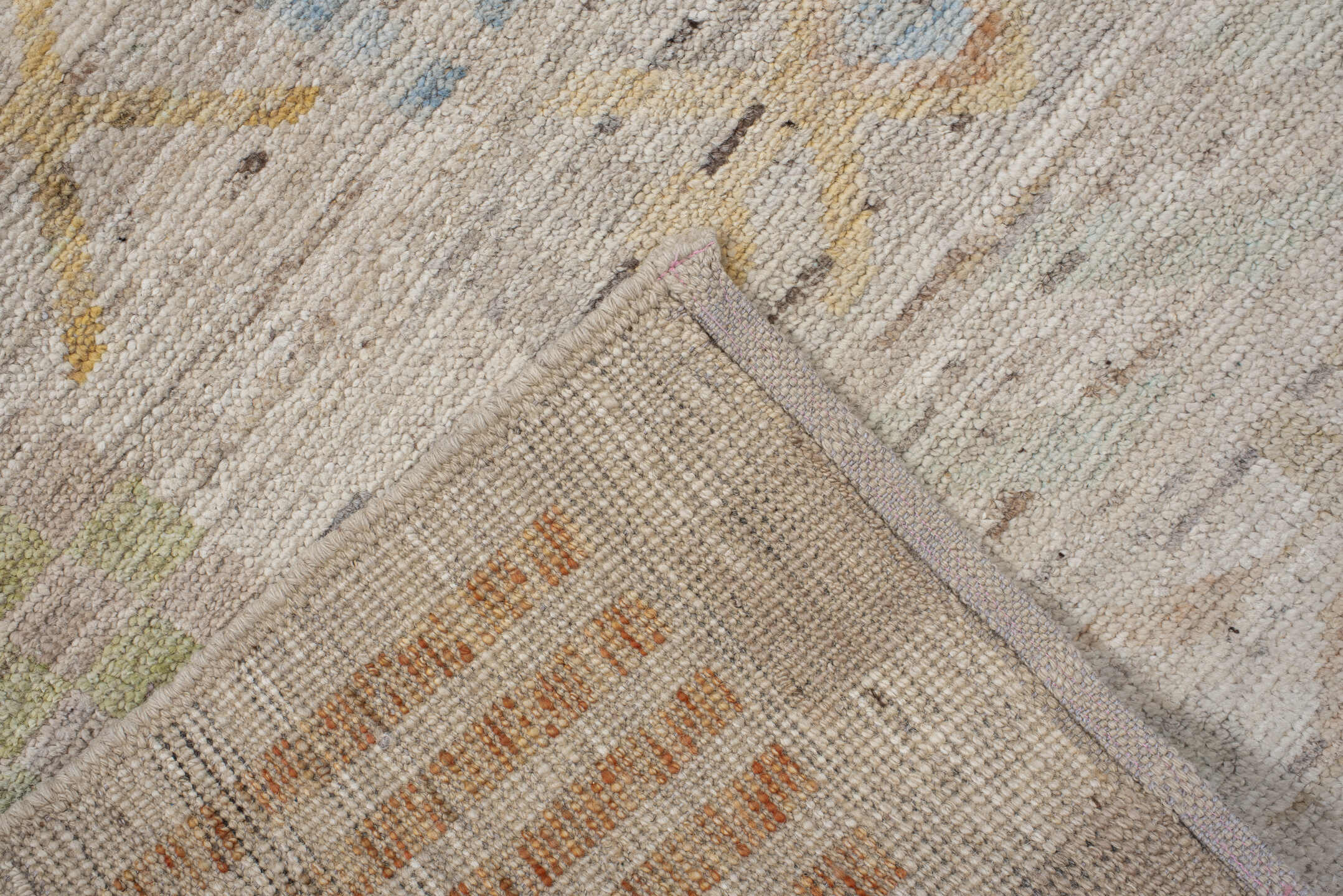 2' x 9' one-of-a-kind handmade vintage Tulu runner rug. Color palette: ivory, beige, sage, pale blue, soft gold, apricot