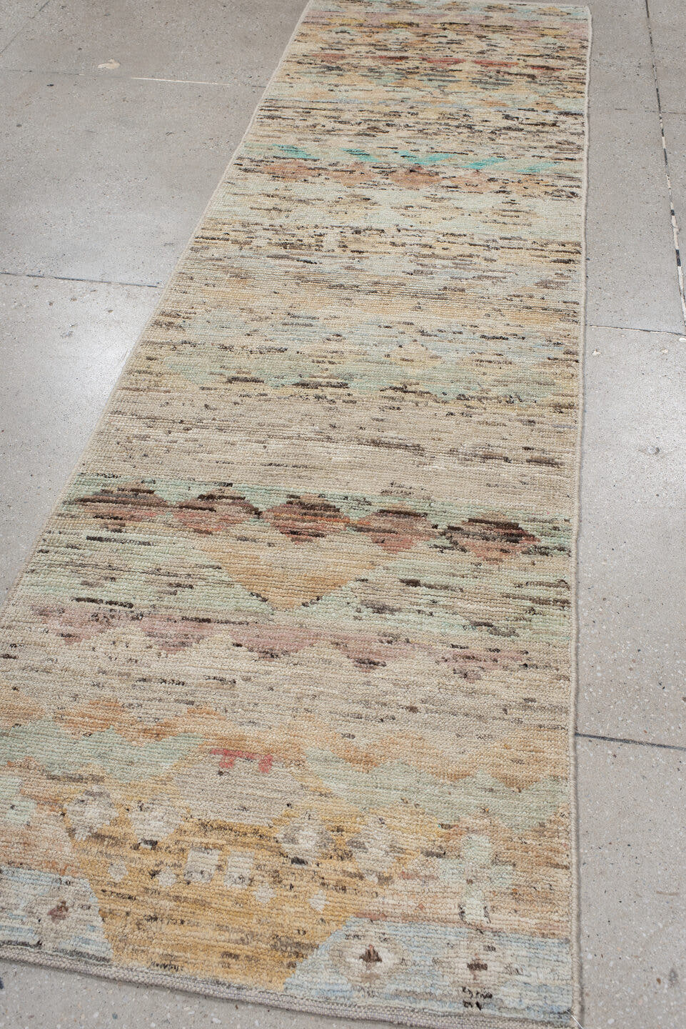 2' x 9' one-of-a-kind handmade vintage Tulu runner rug. Color palette: ivory, taupe, camel, aqua, blush, charcoal, rust