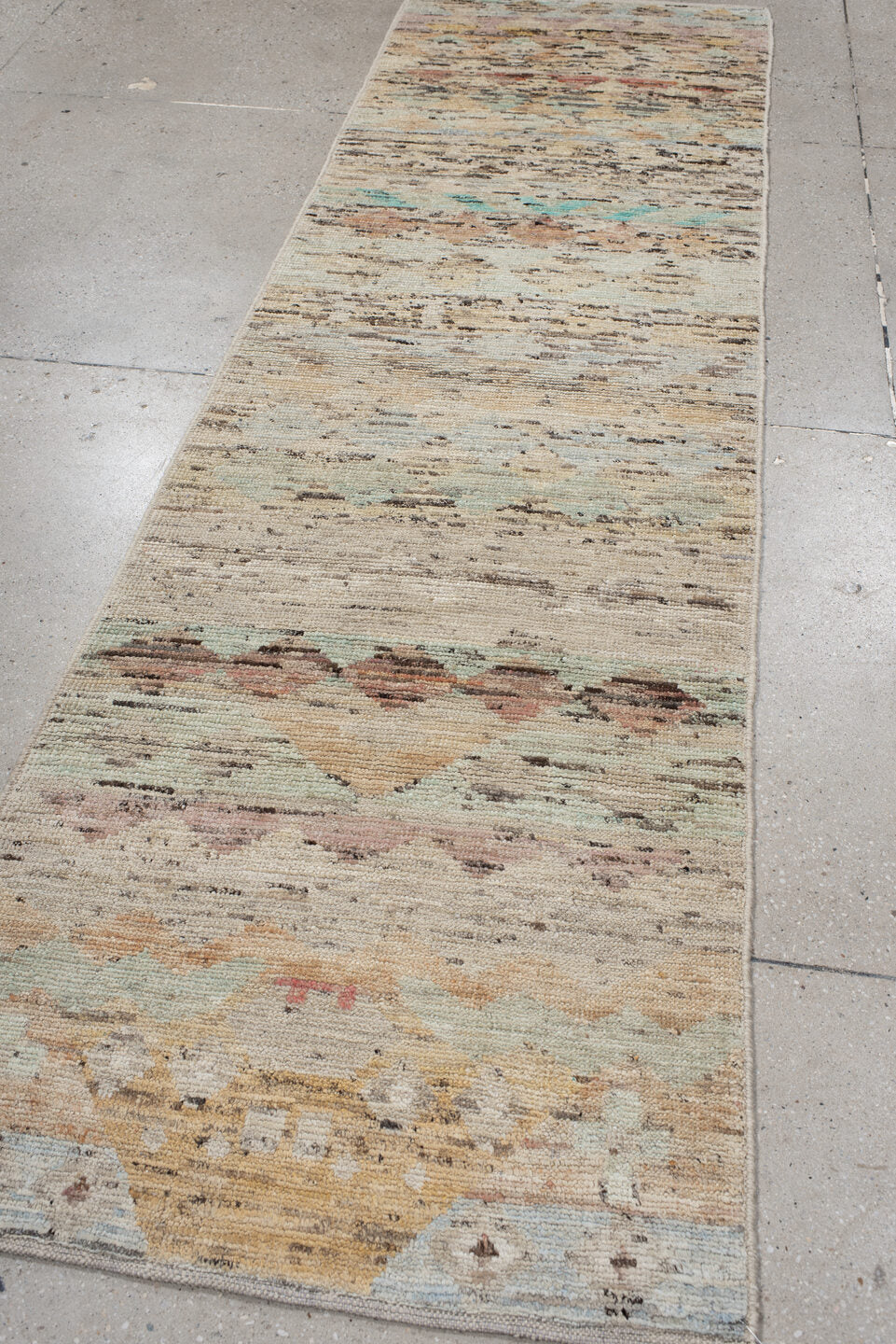 2' x 9' one-of-a-kind handmade vintage Tulu runner rug. Color palette: ivory, taupe, camel, aqua, blush, charcoal, rust