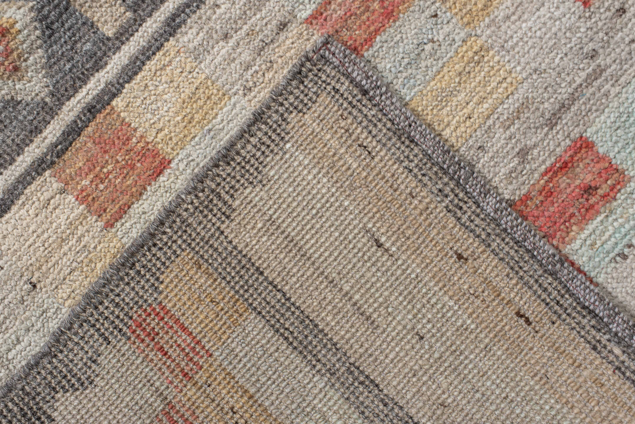 2' x 9' one-of-a-kind handmade vintage Tulu runner rug. Color palette: charcoal, ivory, camel, rust, cream, taupe, gray