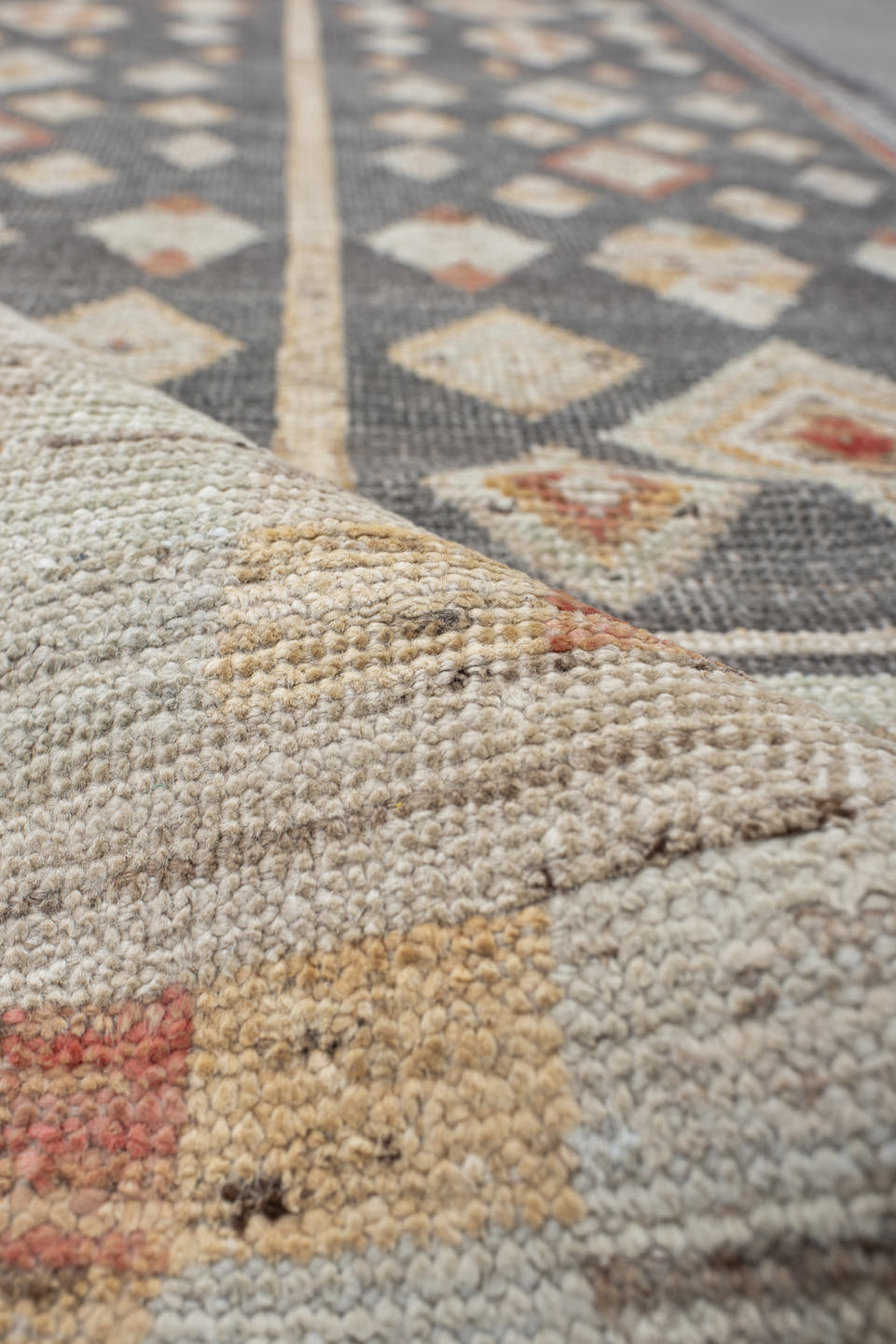 2' x 9' one-of-a-kind handmade vintage Tulu runner rug. Color palette: charcoal, ivory, camel, rust, cream, taupe, gray