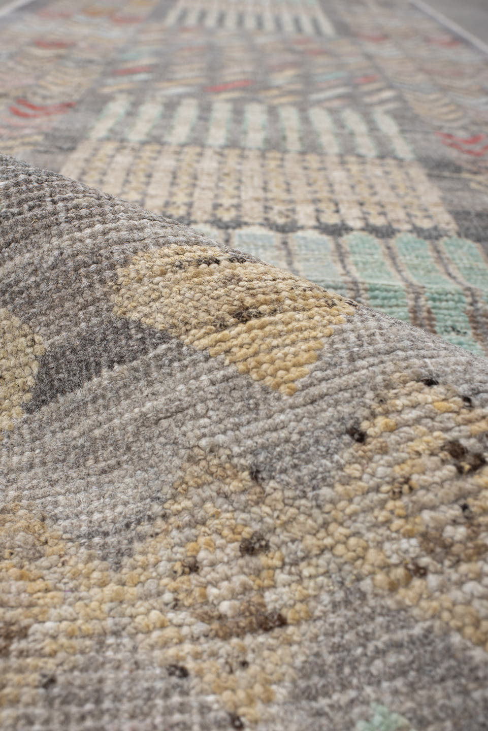 2' x 9' one-of-a-kind handmade vintage Tulu runner rug. Color palette: gray, ivory, taupe, pale aqua, butter yellow, blush