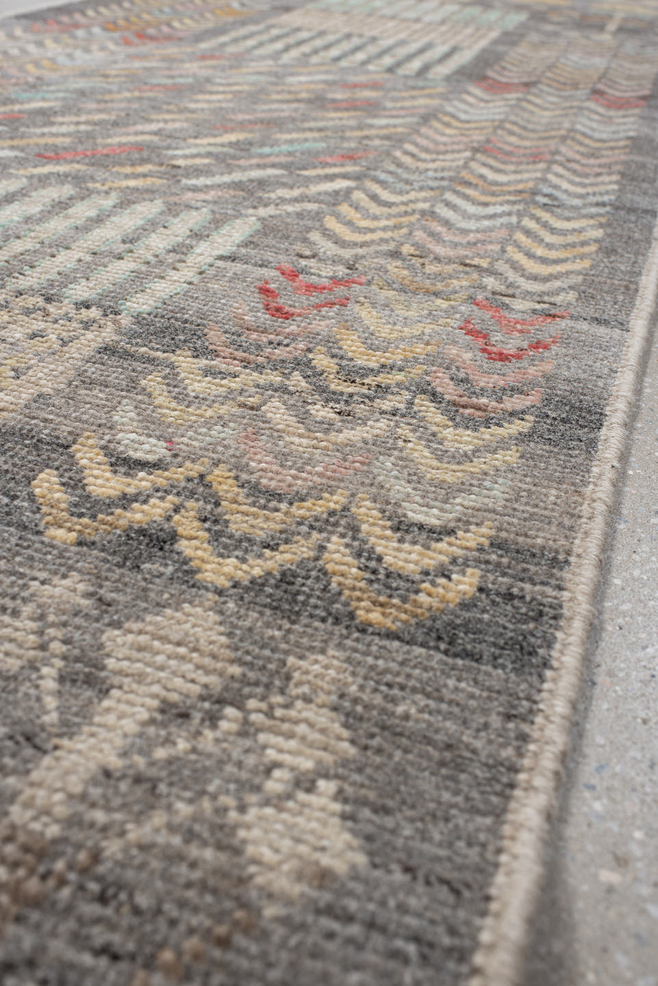 2' x 9' one-of-a-kind handmade vintage Tulu runner rug. Color palette: gray, ivory, taupe, pale aqua, butter yellow, blush