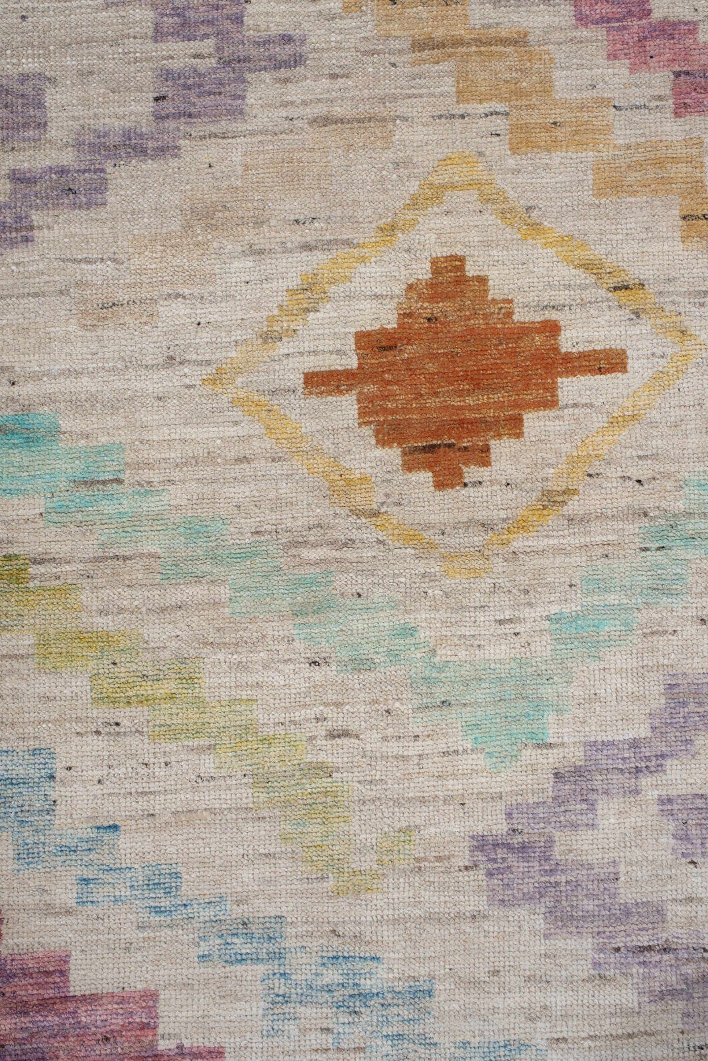 3' x 9' one-of-a-kind handmade vintage Tulu runner rug. Color palette: ivory, lavender, aqua, rust, gold, sage, rose, peach