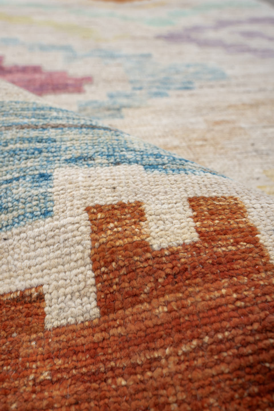 3' x 9' one-of-a-kind handmade vintage Tulu runner rug. Color palette: ivory, lavender, aqua, rust, gold, sage, rose, peach