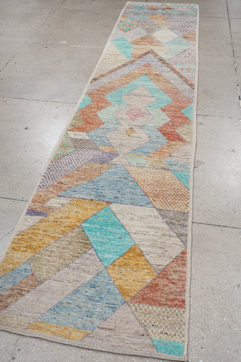 2' x 12' one-of-a-kind handmade vintage Tulu runner rug. Color palette: ivory, aqua, lavender, rust, gold, taupe, sky_blue
