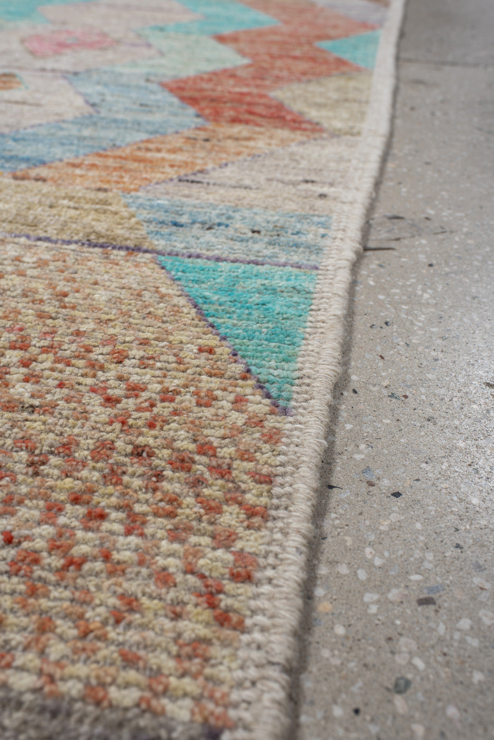 2' x 12' one-of-a-kind handmade vintage Tulu runner rug. Color palette: ivory, aqua, lavender, rust, gold, taupe, sky_blue