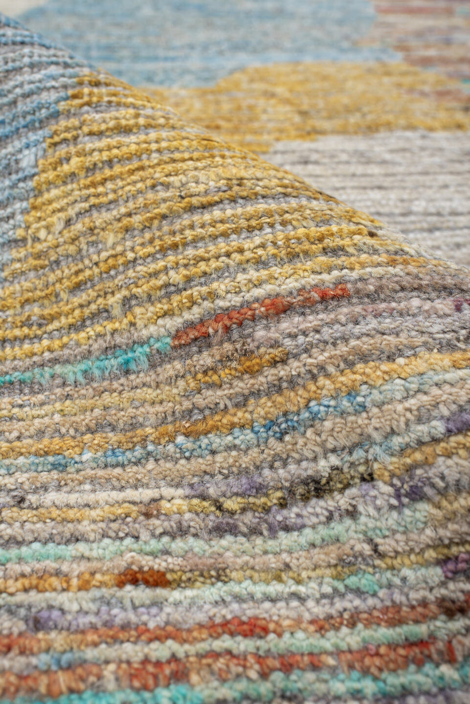 3' x 11' one-of-a-kind handmade vintage Tulu runner rug. Color palette: ivory, sky blue, navy, camel, rust, gold, taupe