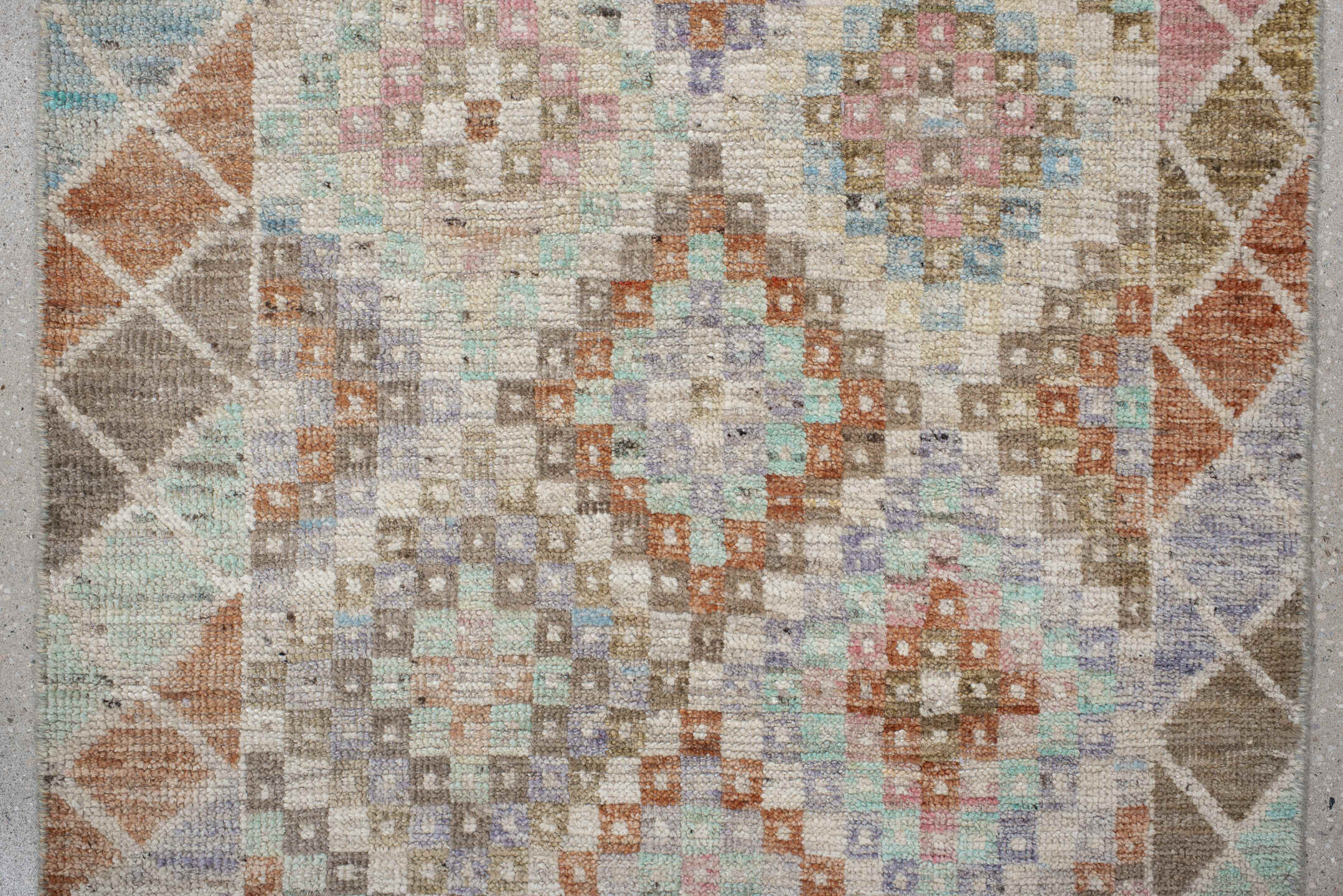 2' x 12' one-of-a-kind handmade vintage Tulu runner rug. Color palette: ivory, taupe, aqua, rust, lavender, rose, sage, sand