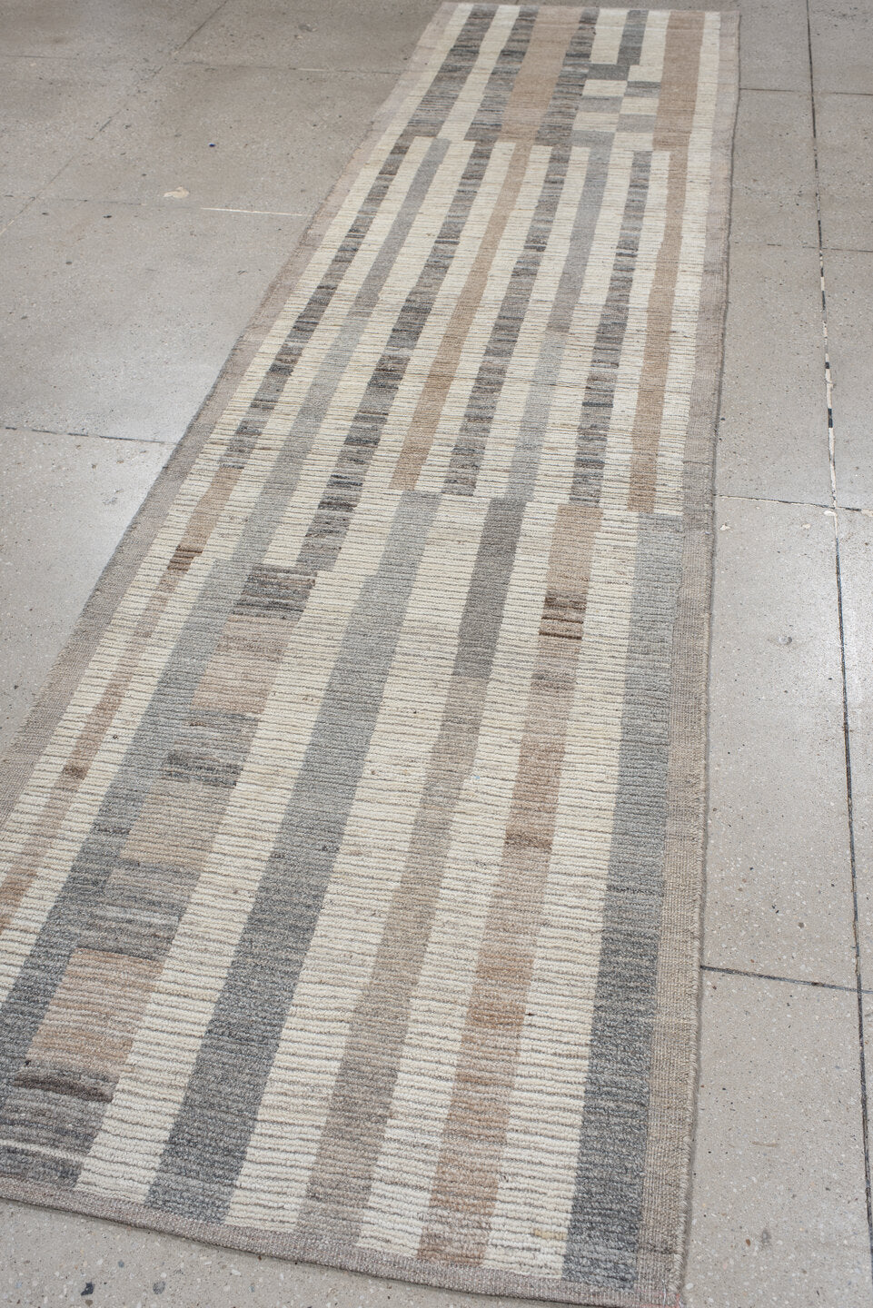 3' x 12' one-of-a-kind handmade vintage Tulu runner rug. Color palette: taupe, ivory, gray, cream, charcoal, greige, beige