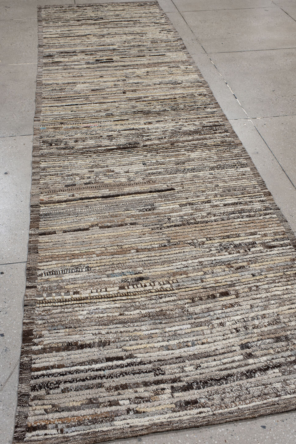 3' x 12' one-of-a-kind handmade vintage Tulu runner rug. Color palette: ivory, taupe, brown, charcoal, gray, beige, black