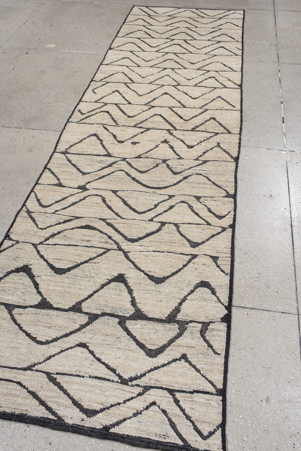 2' x 10' one-of-a-kind handmade vintage Tulu runner rug. Color palette: ivory, charcoal, taupe, gray, black, beige