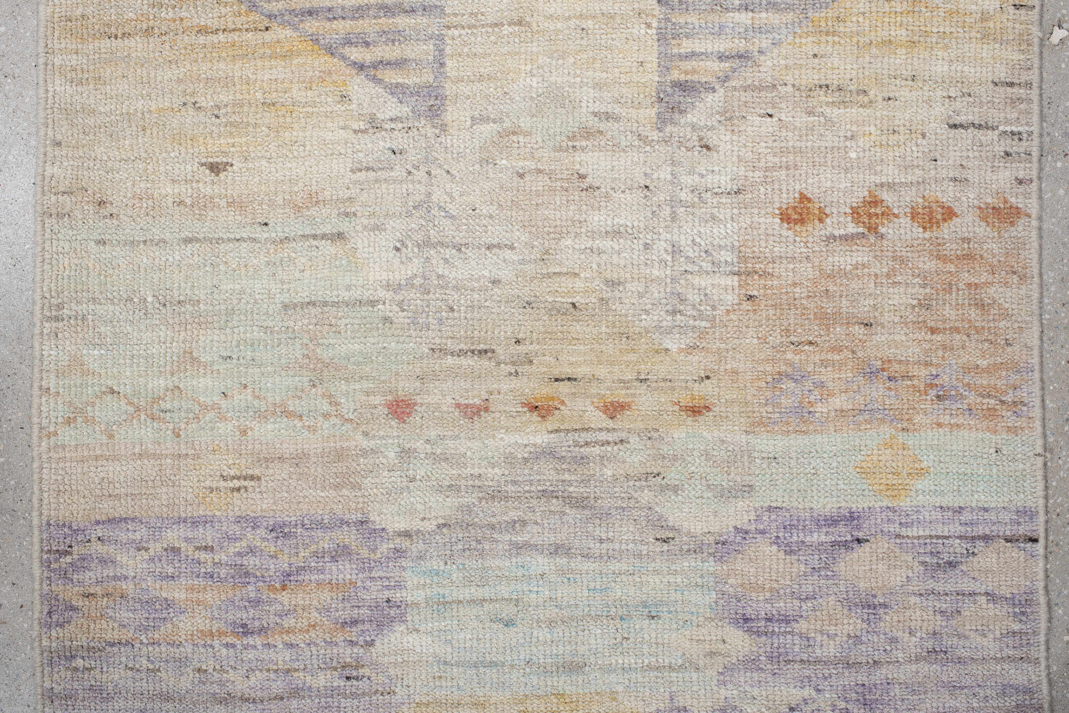 2' x 10' one-of-a-kind handmade vintage Tulu runner rug. Color palette: ivory, lavender, aqua, pale yellow, coral, beige