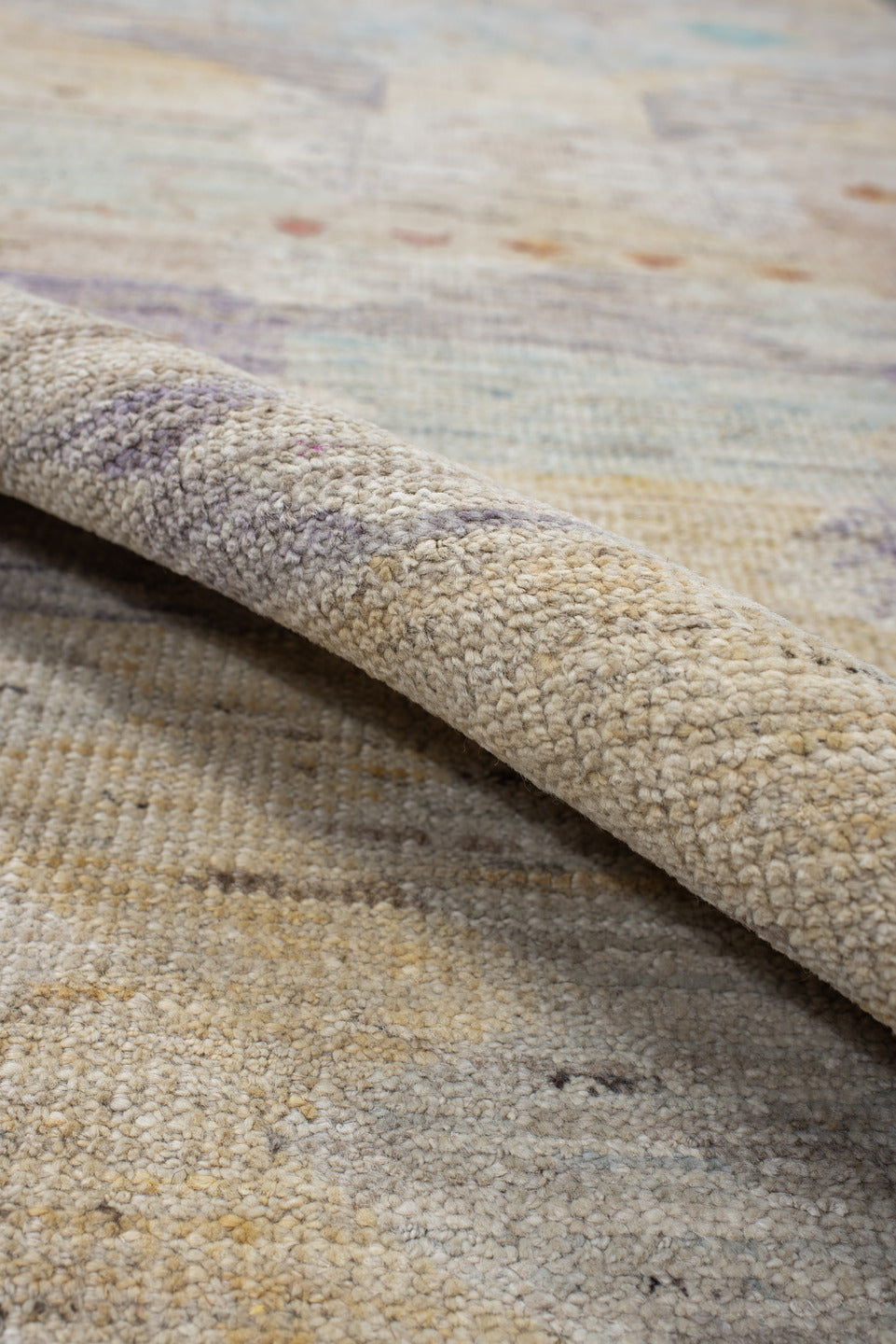 2' x 10' one-of-a-kind handmade vintage Tulu runner rug. Color palette: ivory, lavender, aqua, pale yellow, coral, beige
