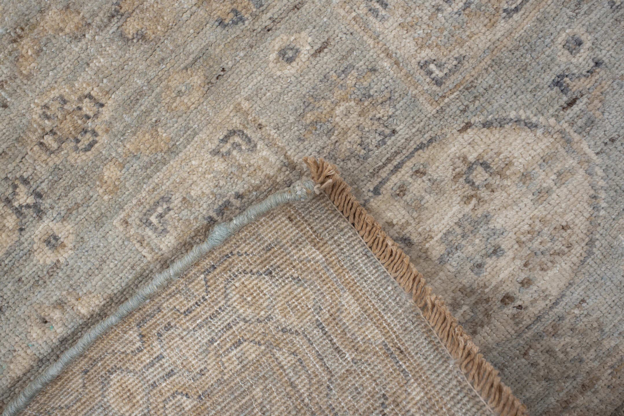 2' x 9' one-of-a-kind handmade vintage Khotan runner rug. Color palette: pale blue, ivory, taupe, beige, camel, slate