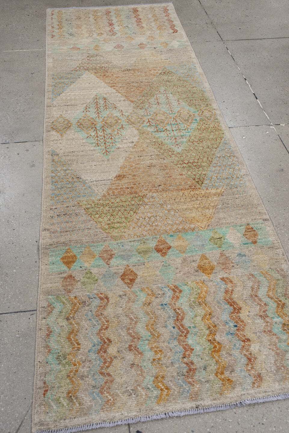 3' x 9' one-of-a-kind handmade vintage Kilim runner rug. Color palette: ivory, beige, pale aqua, peach, sand, soft gold