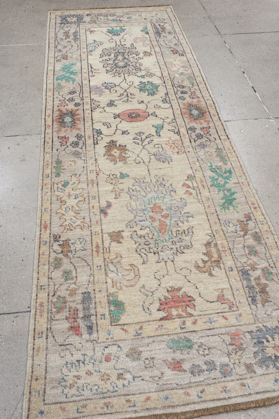 2' x 9' one-of-a-kind handmade vintage Oushak runner rug. Color palette: ivory, beige, aqua, slate, blush, sand, taupe