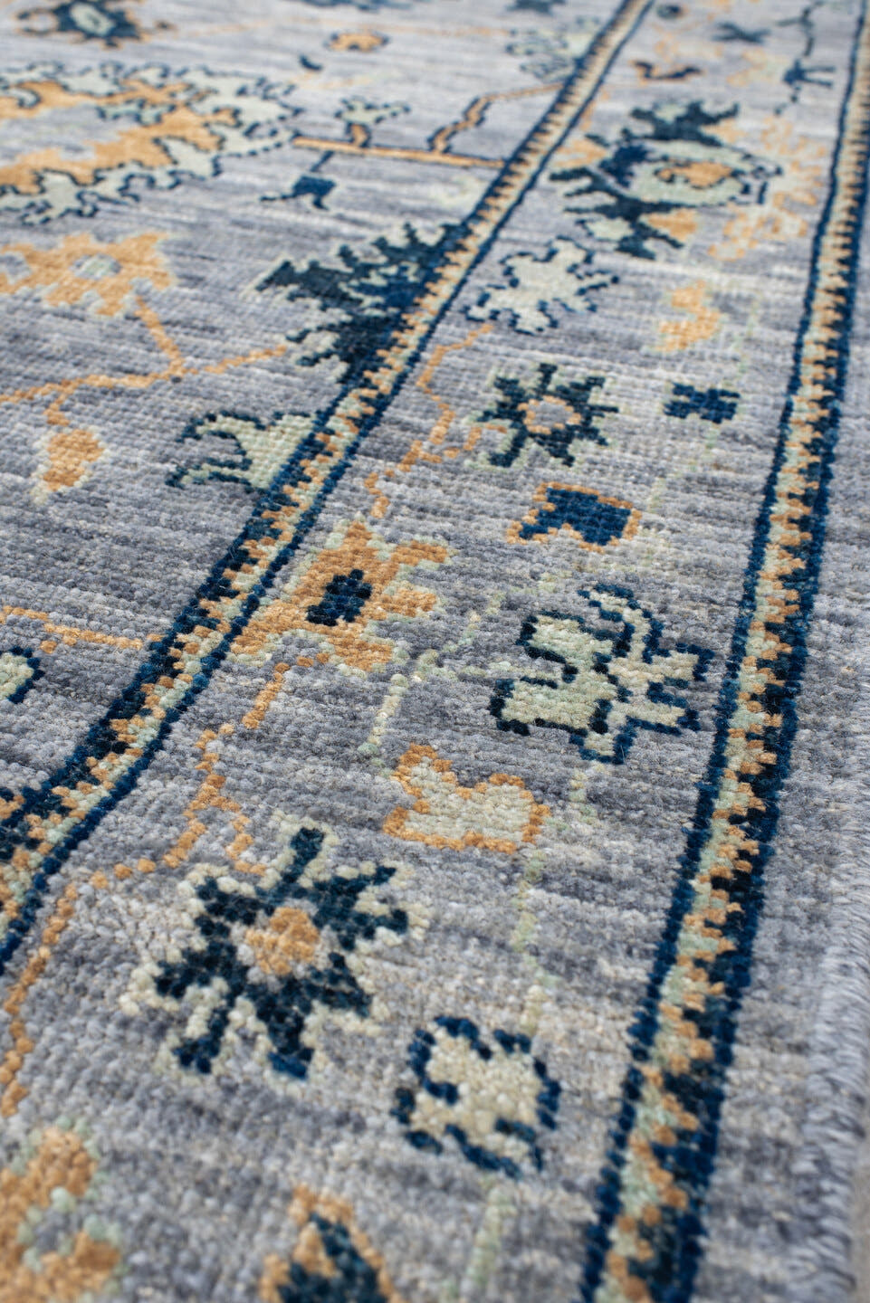 3' x 9' one-of-a-kind handmade vintage Oushak runner rug. Color palette: light blue, navy, ivory, gold, slate, cream, blue