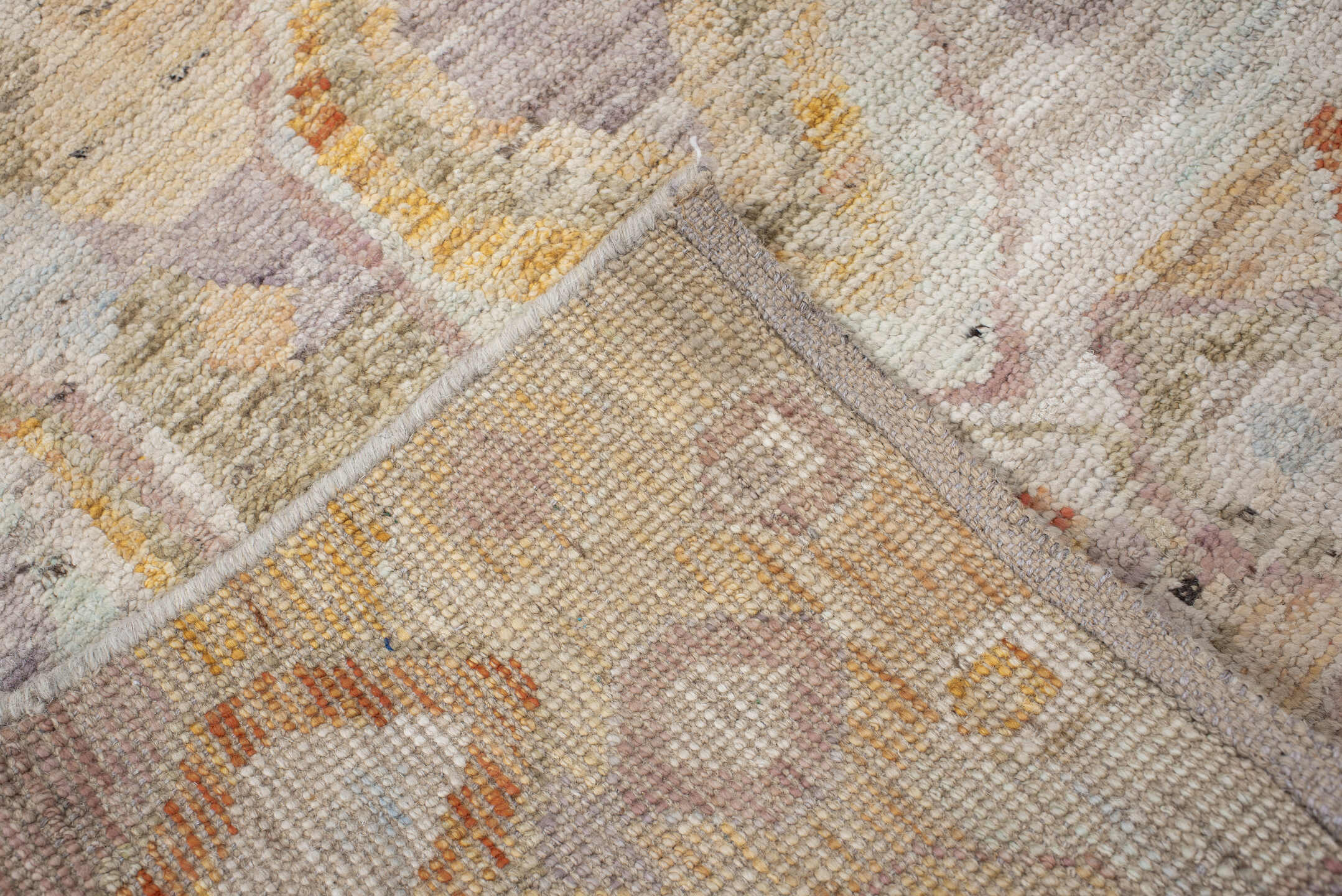 2' x 9' one-of-a-kind handmade vintage Kilim runner rug. Color palette: ivory, lavender, apricot, pale blue, beige, sage