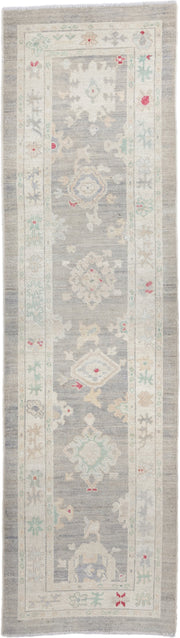 3' x 10' one-of-a-kind handmade vintage Oushak runner rug. Color palette: gray, ivory, cream, sage, taupe, rose, beige