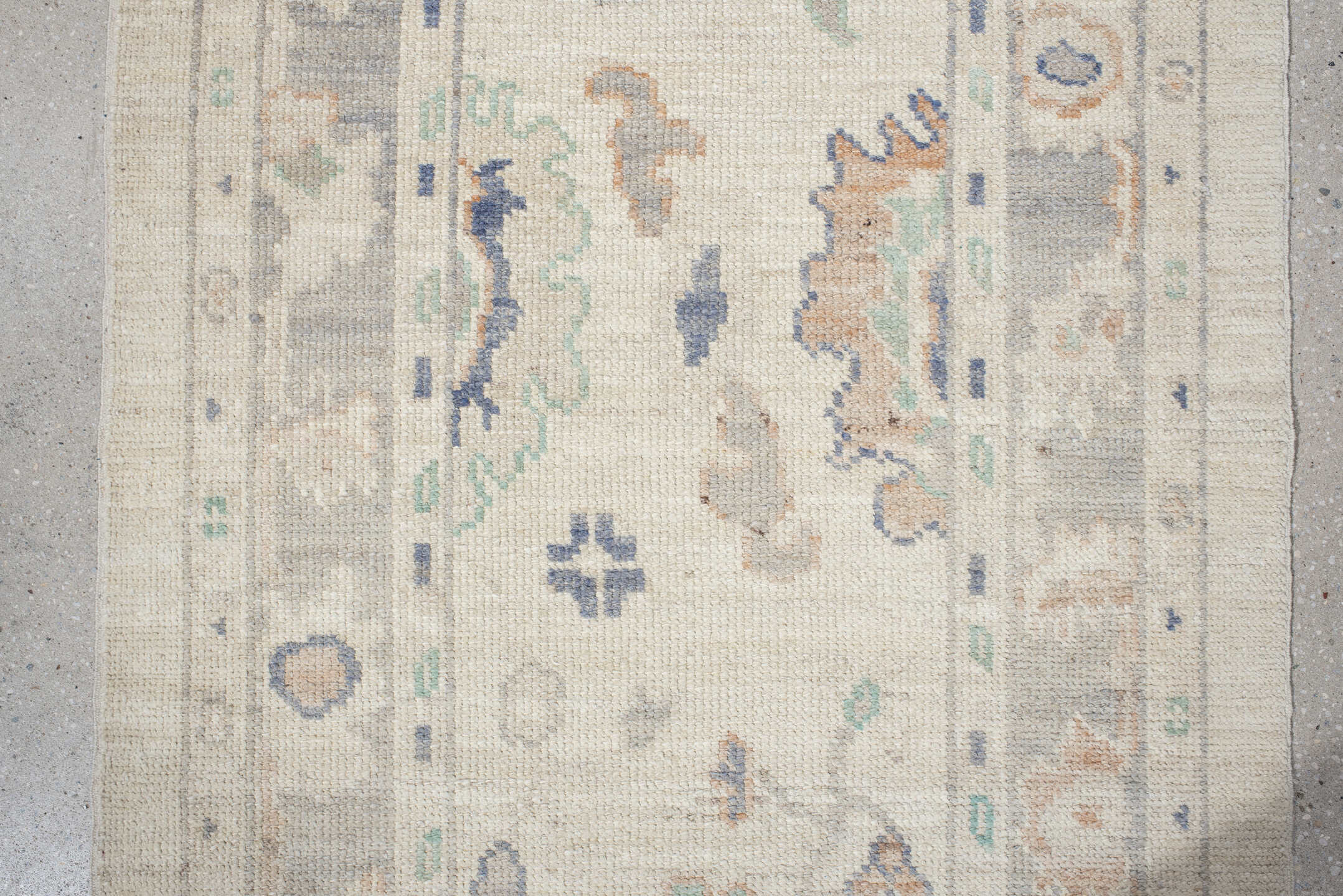 2' x 10' one-of-a-kind handmade vintage Oushak runner rug. Color palette: ivory, light gray, aqua, blue, beige, peach, teal