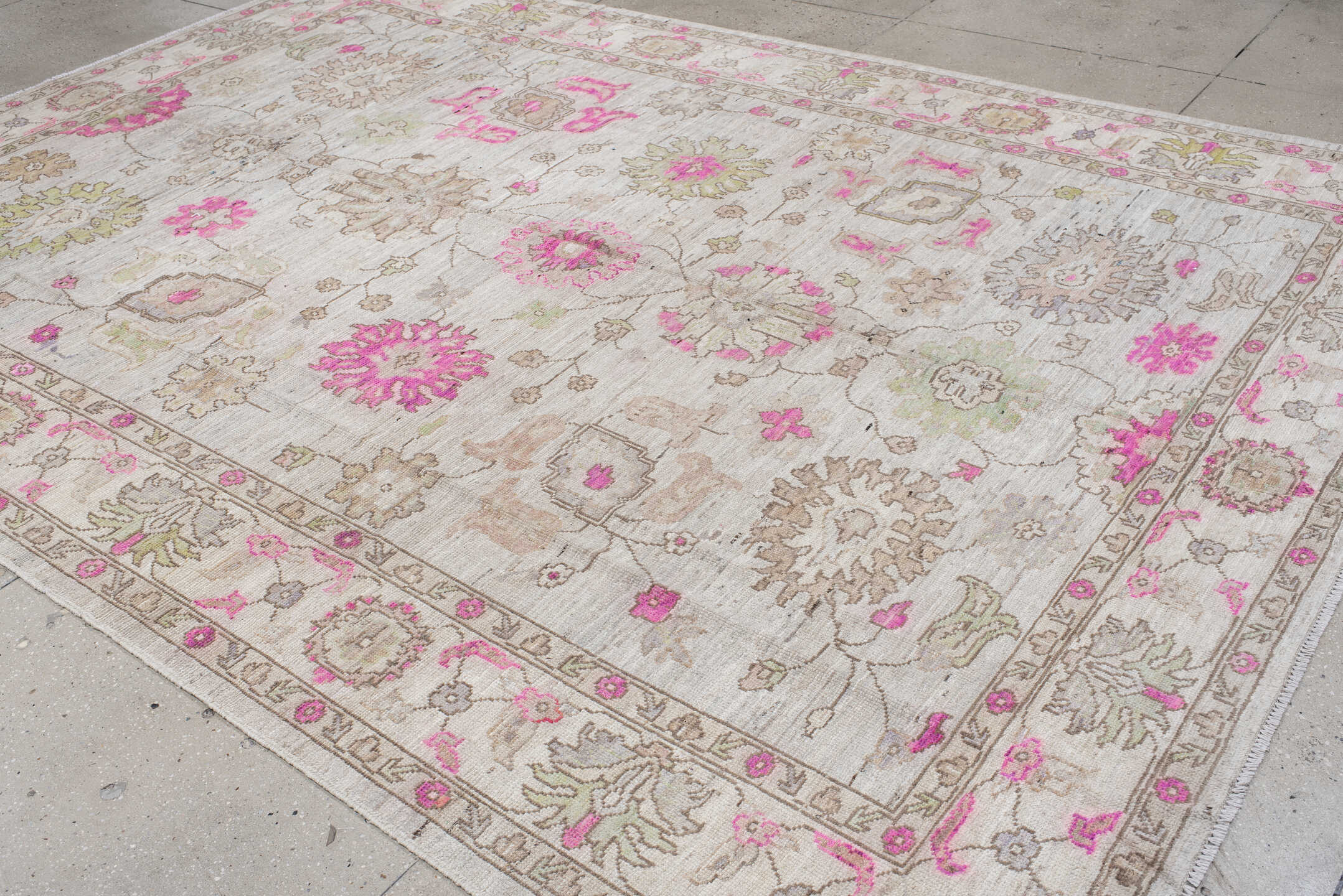 8' x 12' one-of-a-kind handmade vintage Oushak large size rug. Color palette: ivory, taupe, pink, beige, pale olive, cream
