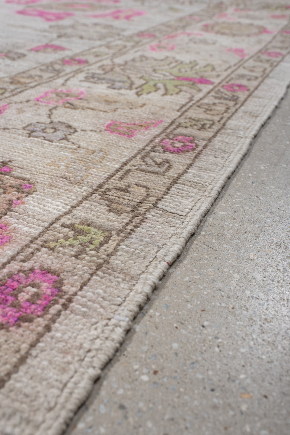 8' x 12' one-of-a-kind handmade vintage Oushak large size rug. Color palette: ivory, taupe, pink, beige, pale olive, cream