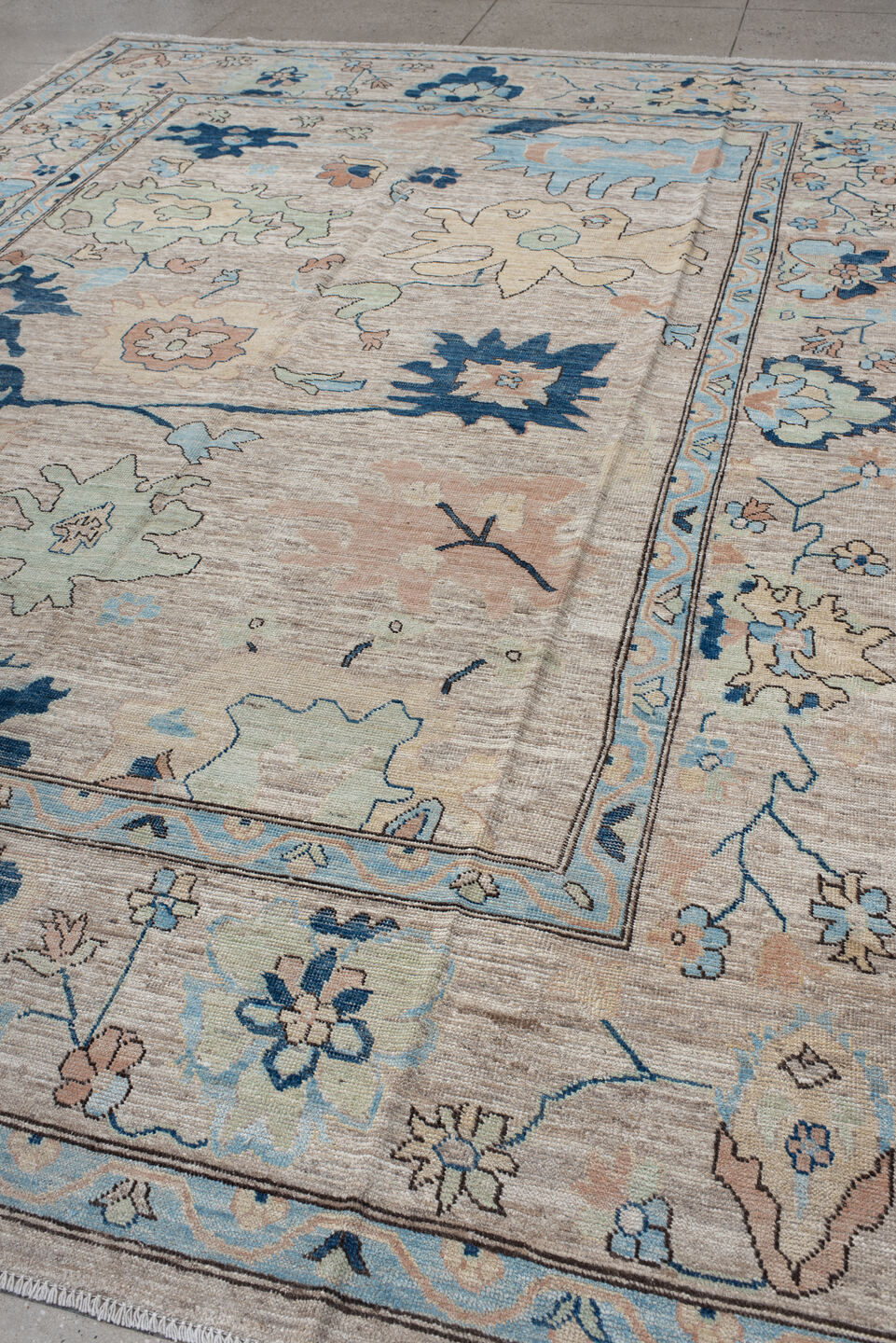 10' x 13' one-of-a-kind handmade vintage Oushak large size rug. Color palette: ivory, sky blue, navy, blush, sage, taupe