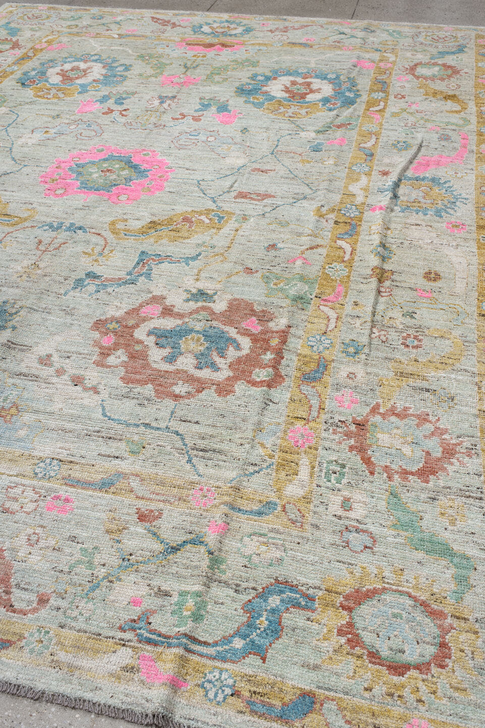 10' x 13' one-of-a-kind handmade vintage Oushak large size rug. Color palette: ivory, sky blue, blush pink, gold