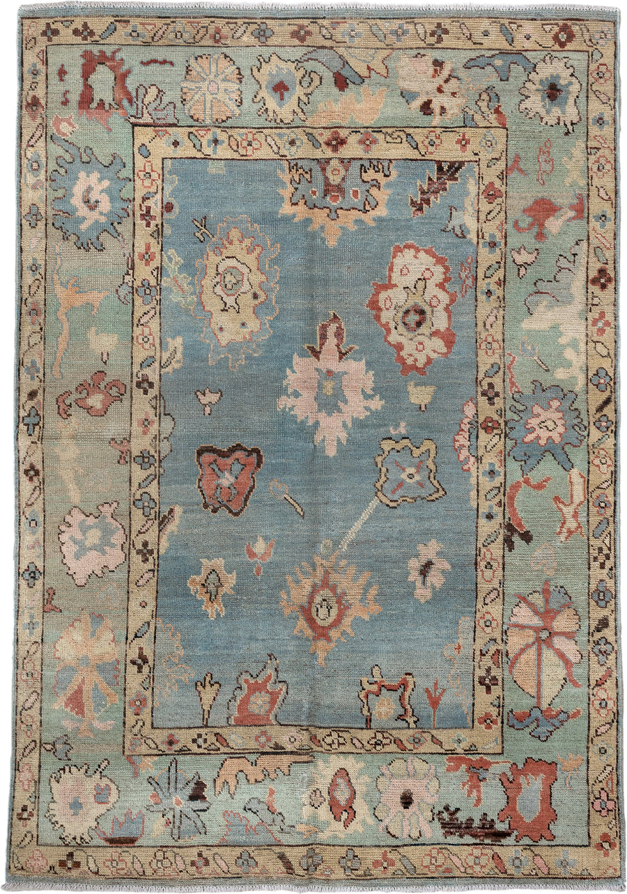 5' x 7' one-of-a-kind handmade vintage Oushak medium size rug. Color palette: sky blue, ivory, sage, rust, rose, taupe