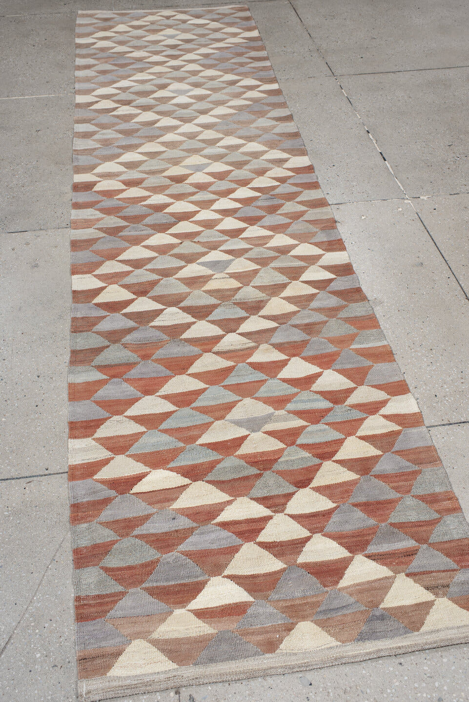 2' x 10' one-of-a-kind handmade vintage Kilim runner rug. Color palette: taupe, ivory, slate, terra cotta, camel, gray