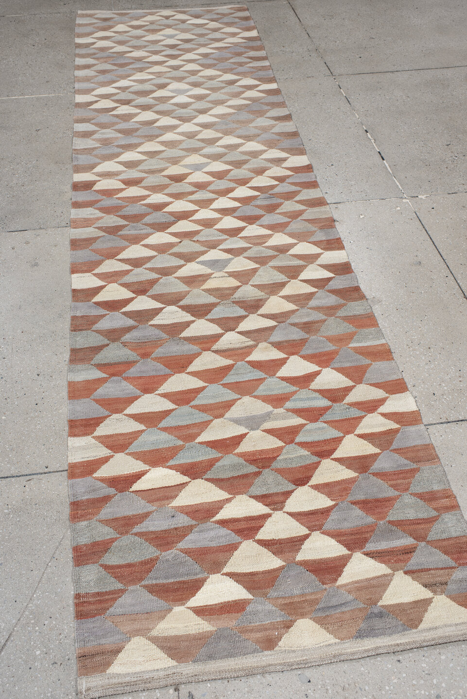 2' x 10' one-of-a-kind handmade vintage Kilim runner rug. Color palette: taupe, ivory, slate, terra cotta, camel, gray