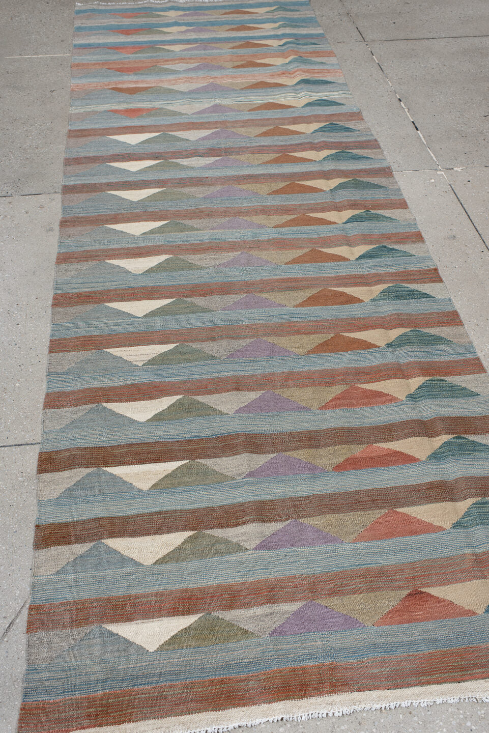 3' x 9' one-of-a-kind handmade vintage Kilim runner rug. Color palette: sky blue, taupe, terra cotta, ivory, sage, lavender