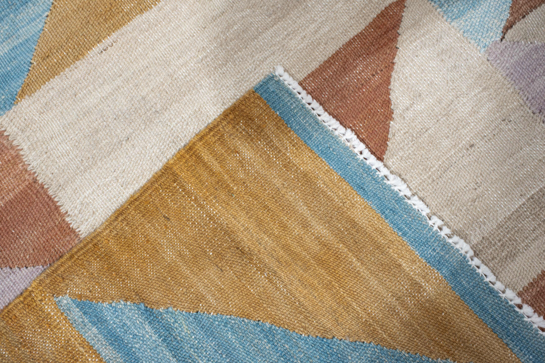 3' x 9' one-of-a-kind handmade vintage Kilim runner rug. Color palette: ivory, sky blue, camel, rose, lavender, tan