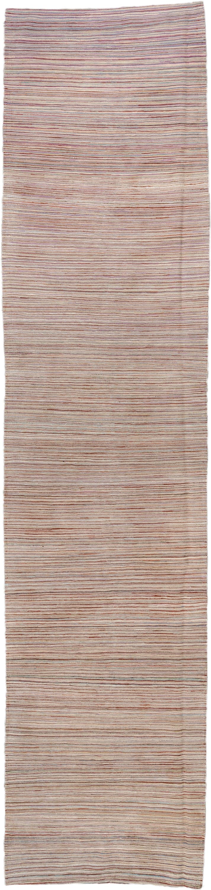 2' x 12' one-of-a-kind handmade vintage Kilim runner rug. Color palette: ivory, rust, slate, muted blue, taupe, terracotta