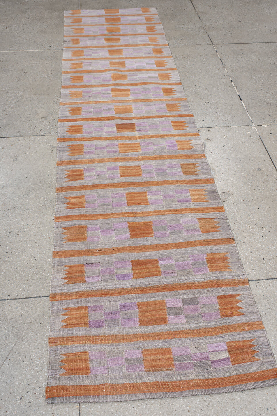 2' x 9' one-of-a-kind handmade vintage Kilim runner rug. Color palette: gray, peach, lavender, taupe, terracotta, pink