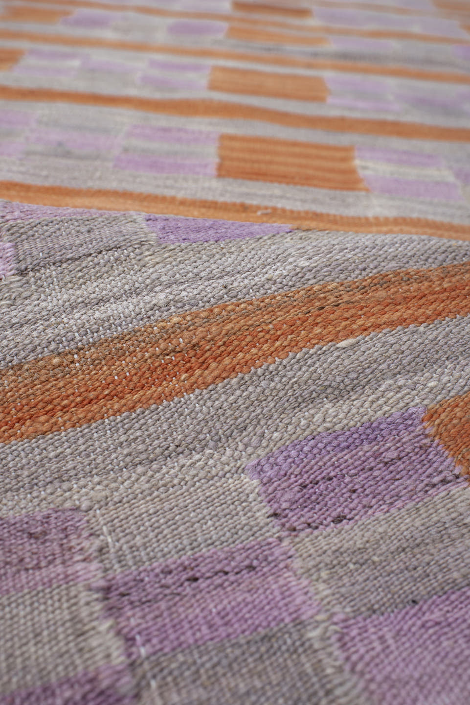 2' x 9' one-of-a-kind handmade vintage Kilim runner rug. Color palette: gray, peach, lavender, taupe, terracotta, pink