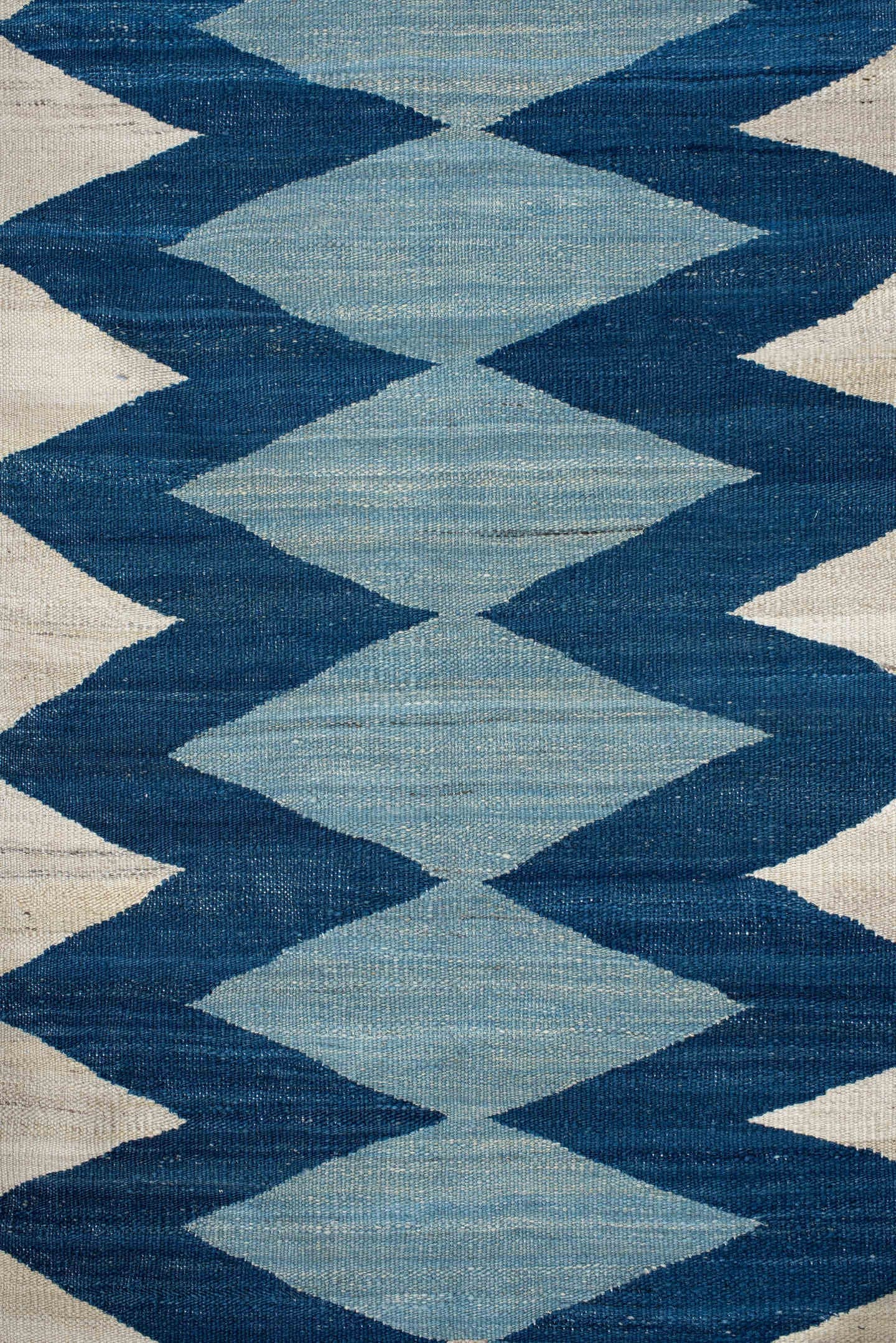 2' x 6' one-of-a-kind handmade vintage Kilim runner rug. Color palette: ivory, indigo, sky blue, teal, camel, rust, purple