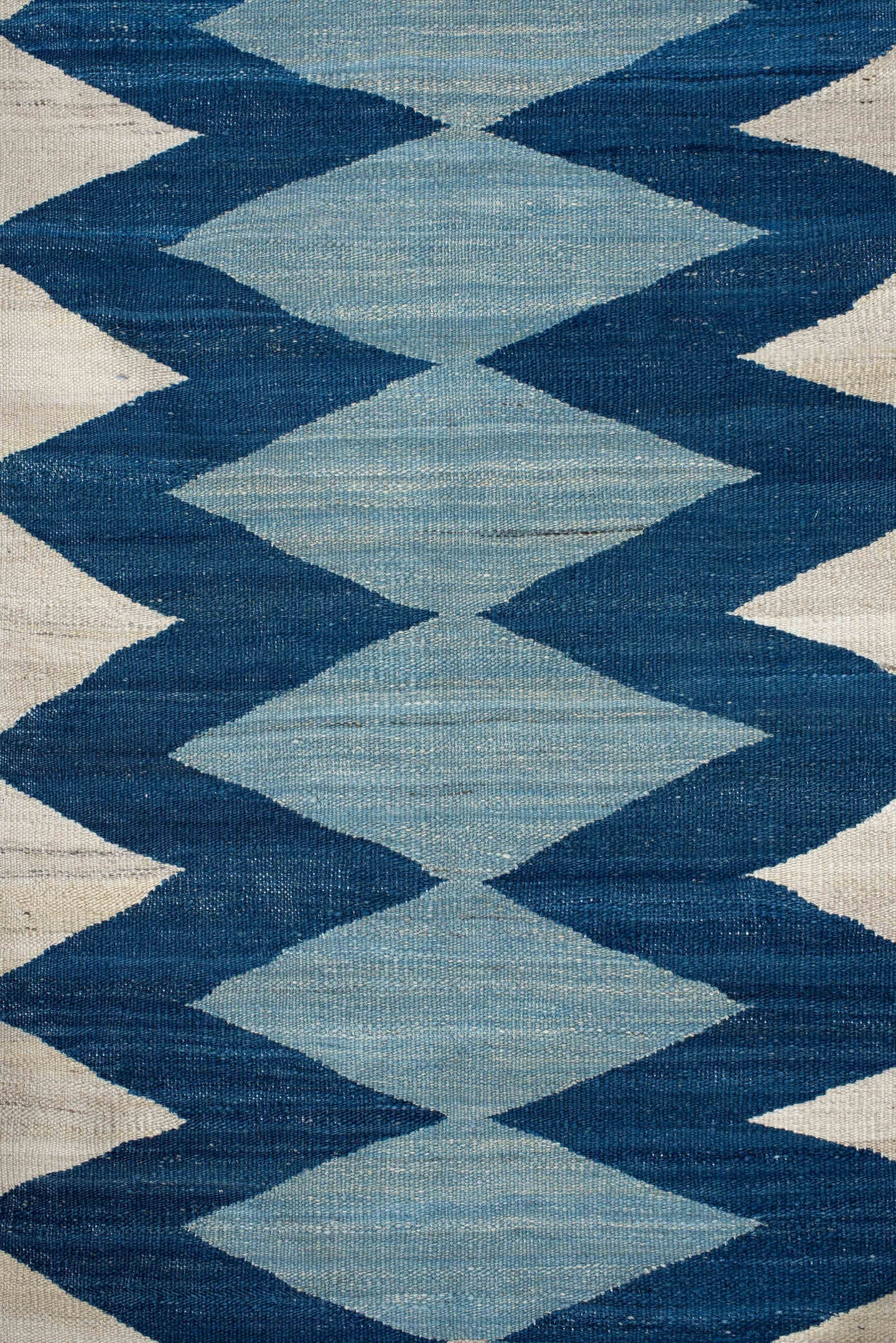 2' x 6' one-of-a-kind handmade vintage Kilim runner rug. Color palette: ivory, indigo, sky blue, teal, camel, rust, purple