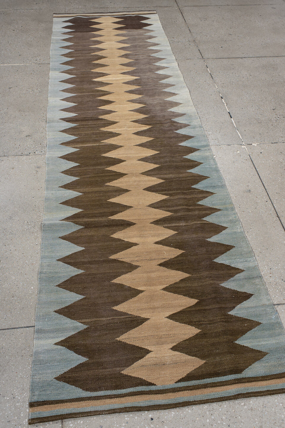 2' x 10' one-of-a-kind handmade vintage Kilim runner rug. Color palette: brown, pale blue, camel, ivory, taupe, light blue