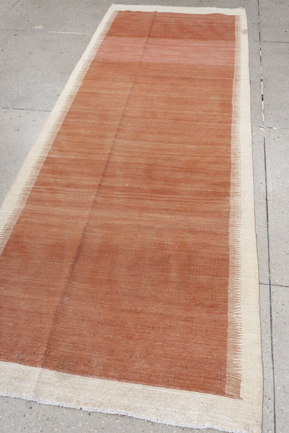2' x 10' one-of-a-kind handmade vintage Kilim runner rug. Color palette: terra cotta, ivory, rose, camel, terracotta, brown