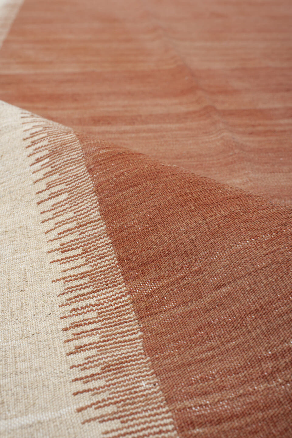2' x 10' one-of-a-kind handmade vintage Kilim runner rug. Color palette: terra cotta, ivory, rose, camel, terracotta, brown