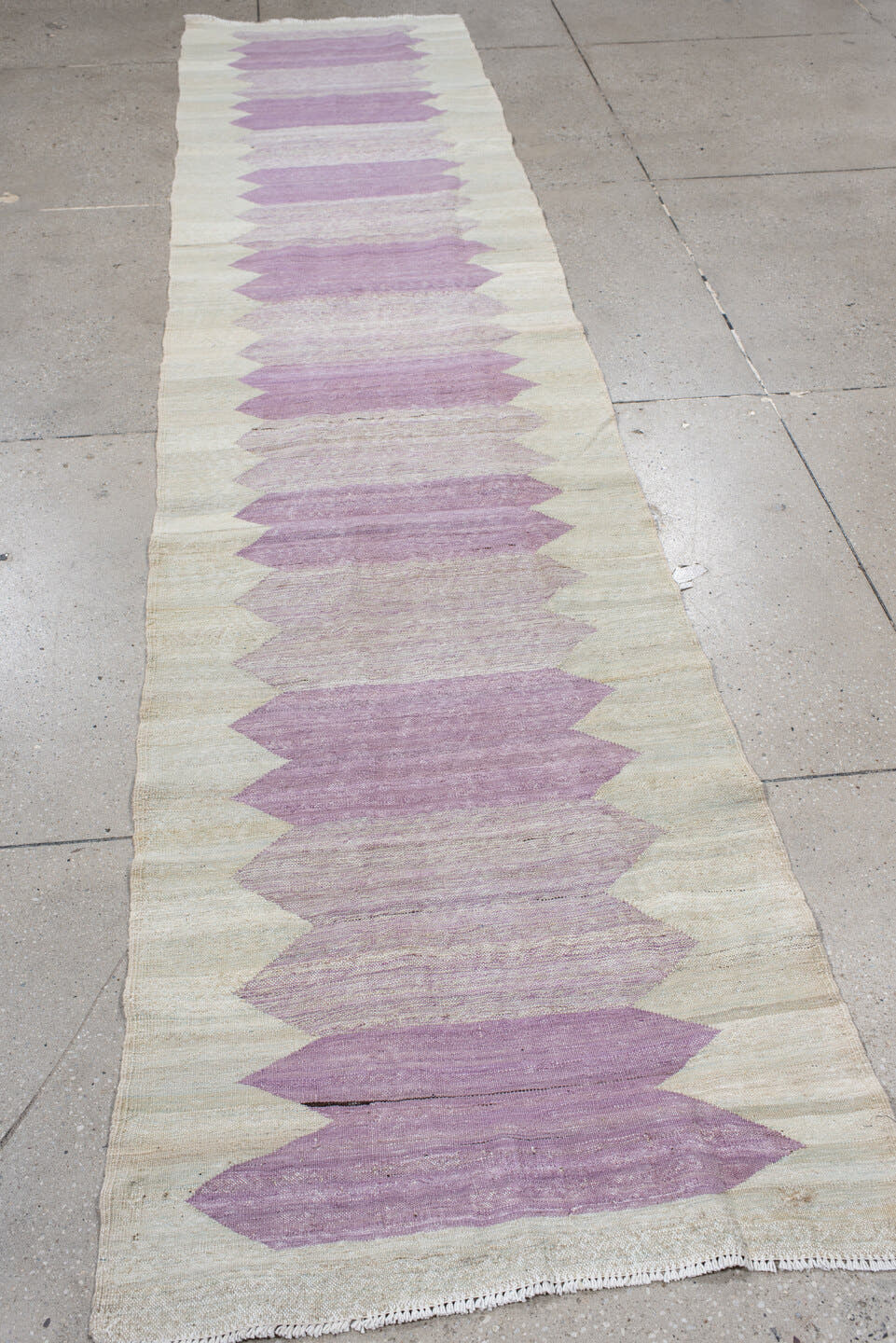 2' x 12' one-of-a-kind handmade vintage Kilim runner rug. Color palette: ivory, lavender, blush, cream, light gray, pink